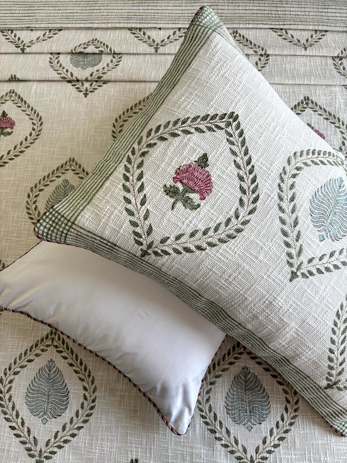 Matching hand block printed jute cotton pillow covers featuring lotus floral motifs from the Padma Vana bedcover set.
