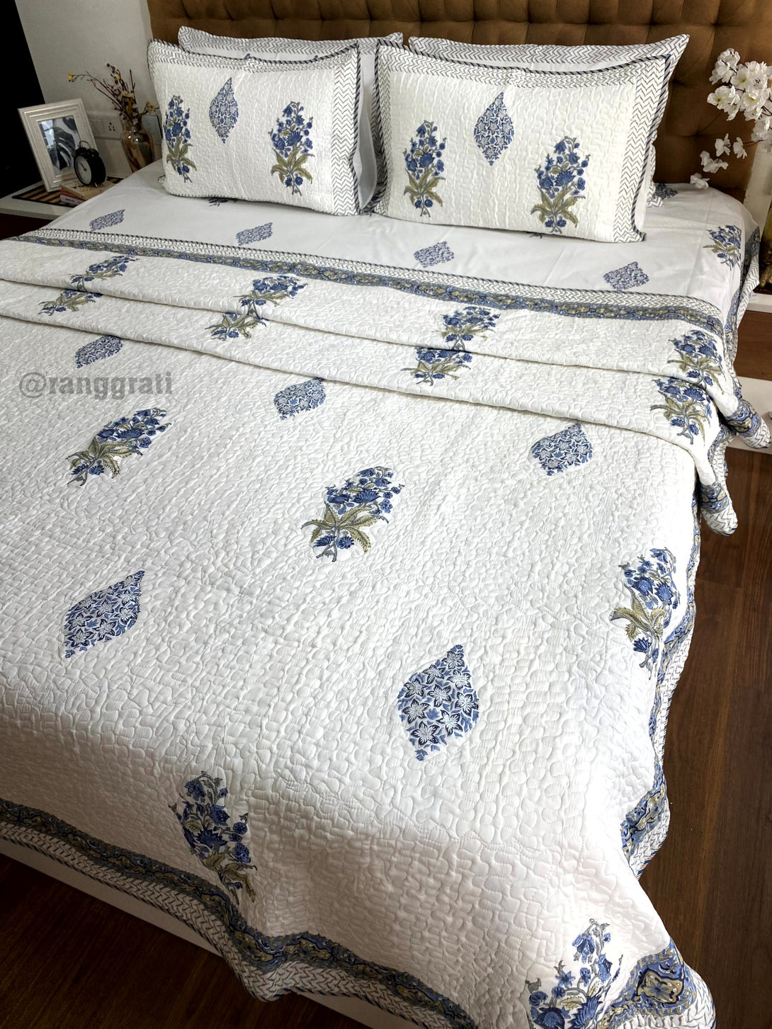Blue Floral Patterned Bedsheet and Matching Quilted Bedcover Ensemble