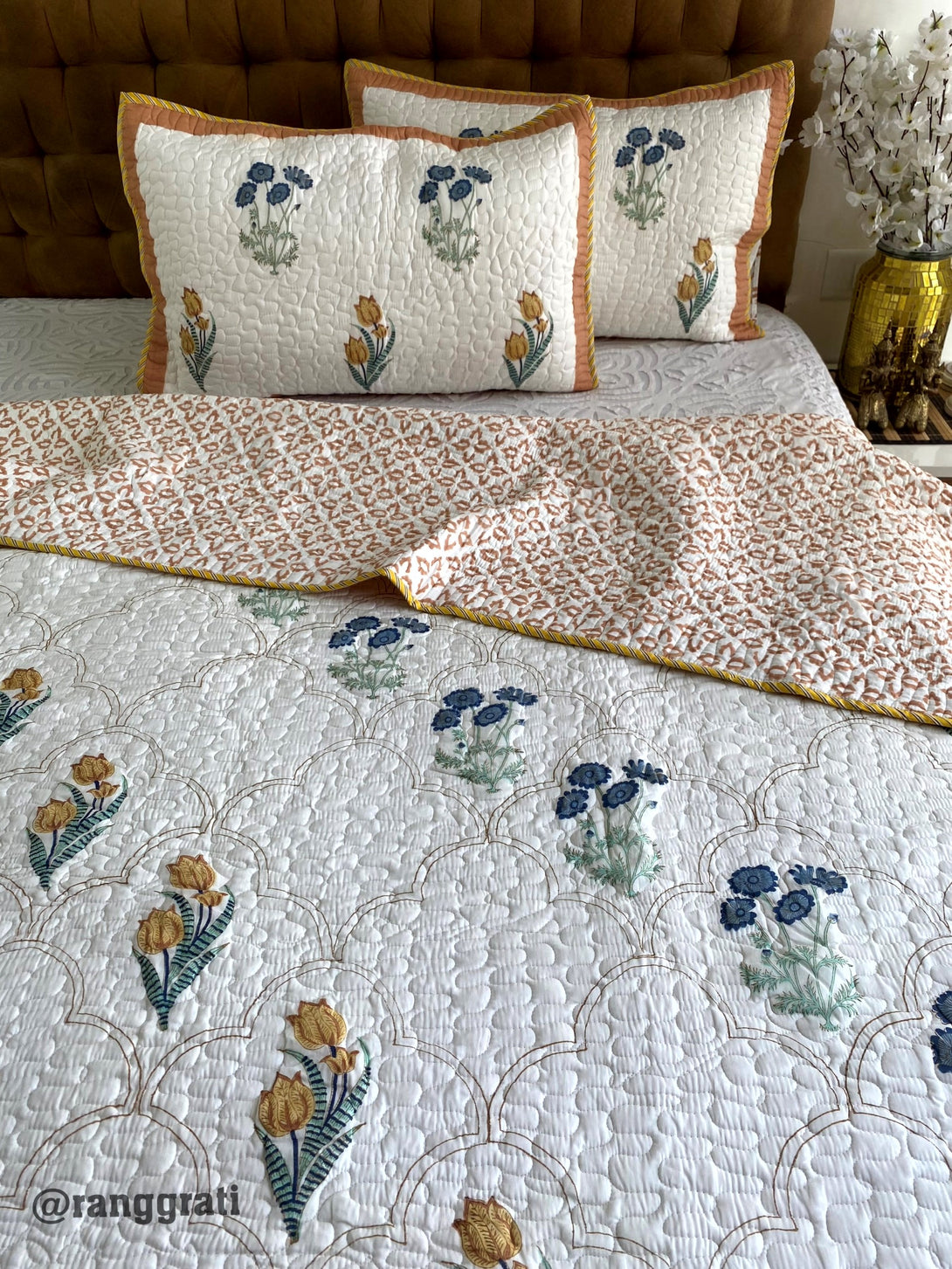 Glowing Rust and Blue Floral Mulmul Voile Quilted Bedcover 90 X 108