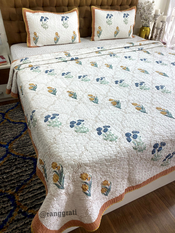 King Size Glowing Rust and Blue Floral Mulmul Voile Quilted Bedcover