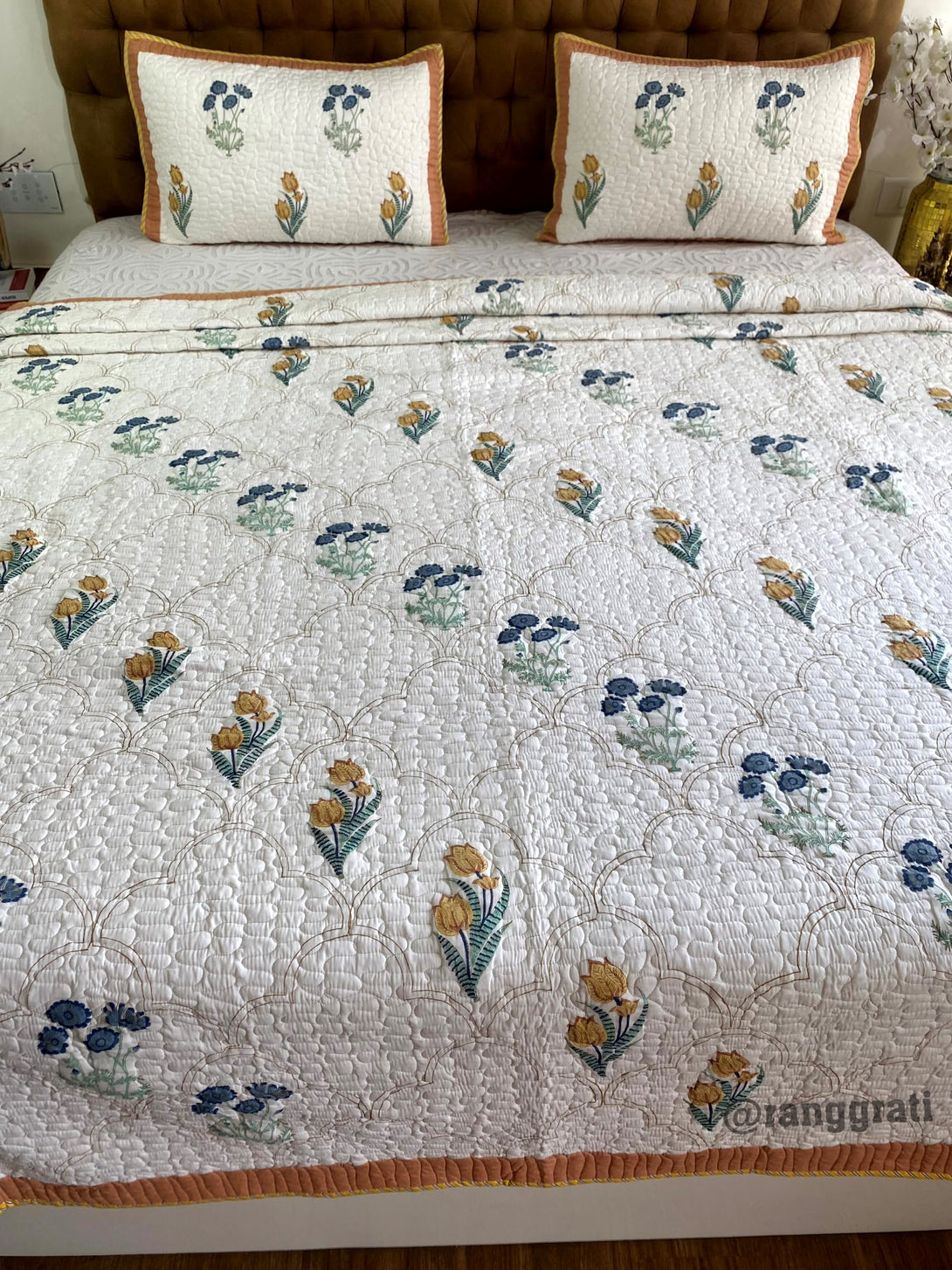 Glowing Rust and Blue Floral Mulmul Voile 90 X 108 Quilted Bedcover 