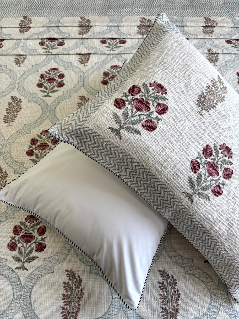 Gul-e-Meher ivory jute cotton king size bedcover with rose floral hand block print and matching pillow covers.