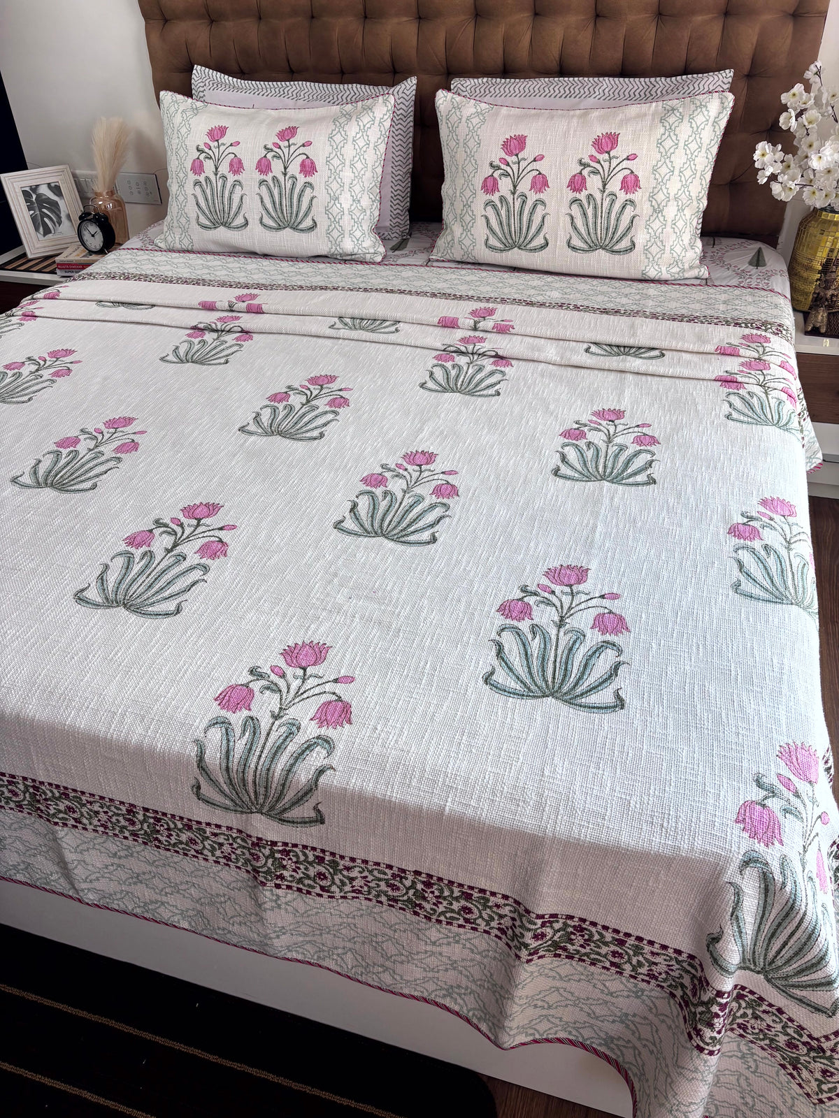 Premium Gulmohar Melody ivory hand block printed jute cotton king size bedcover adding botanical elegance to luxury bedroom décor.