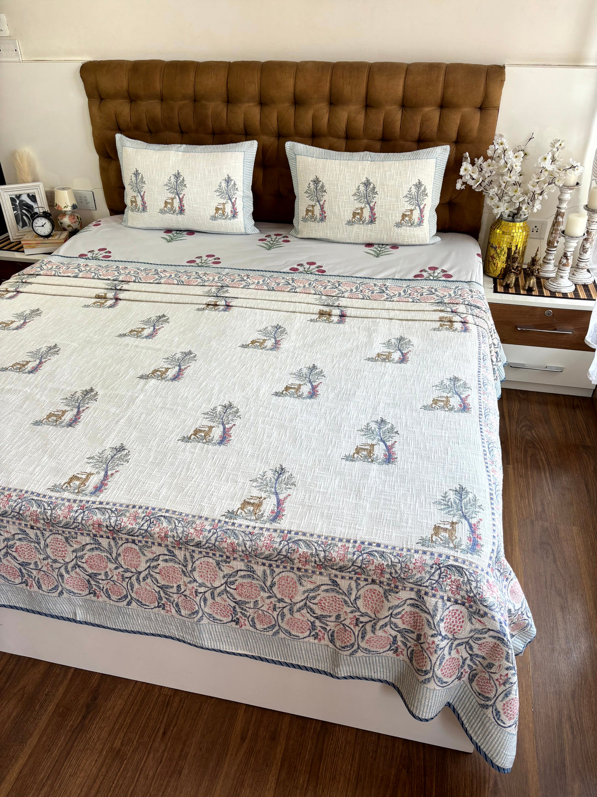 Premium Mrigvana Reverie hand block printed ivory jute cotton king size bedcover bringing woodland elegance to luxury bedroom décor.