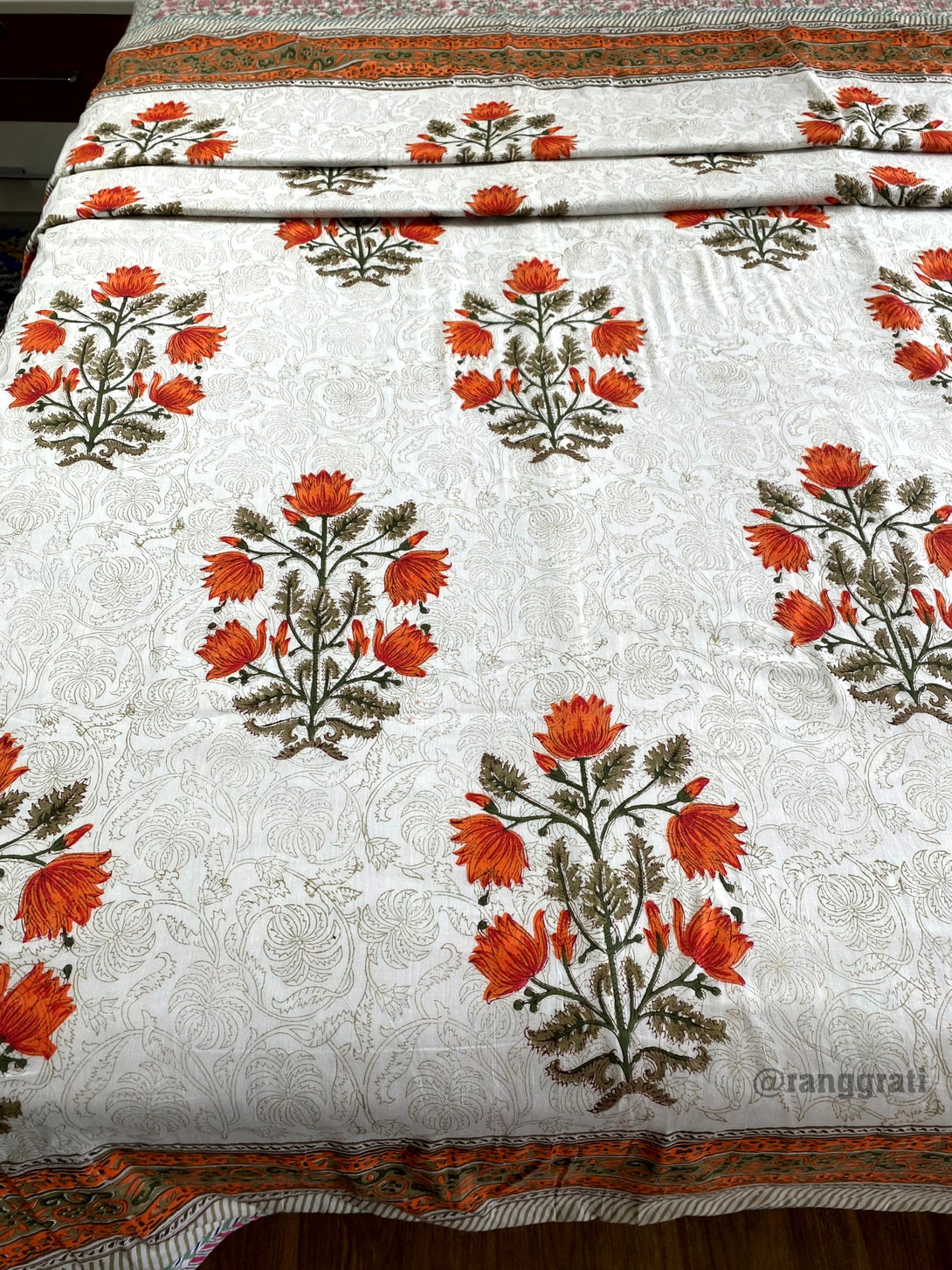 Orange lotus floral reversible dohar for single bed in mulmul cotton