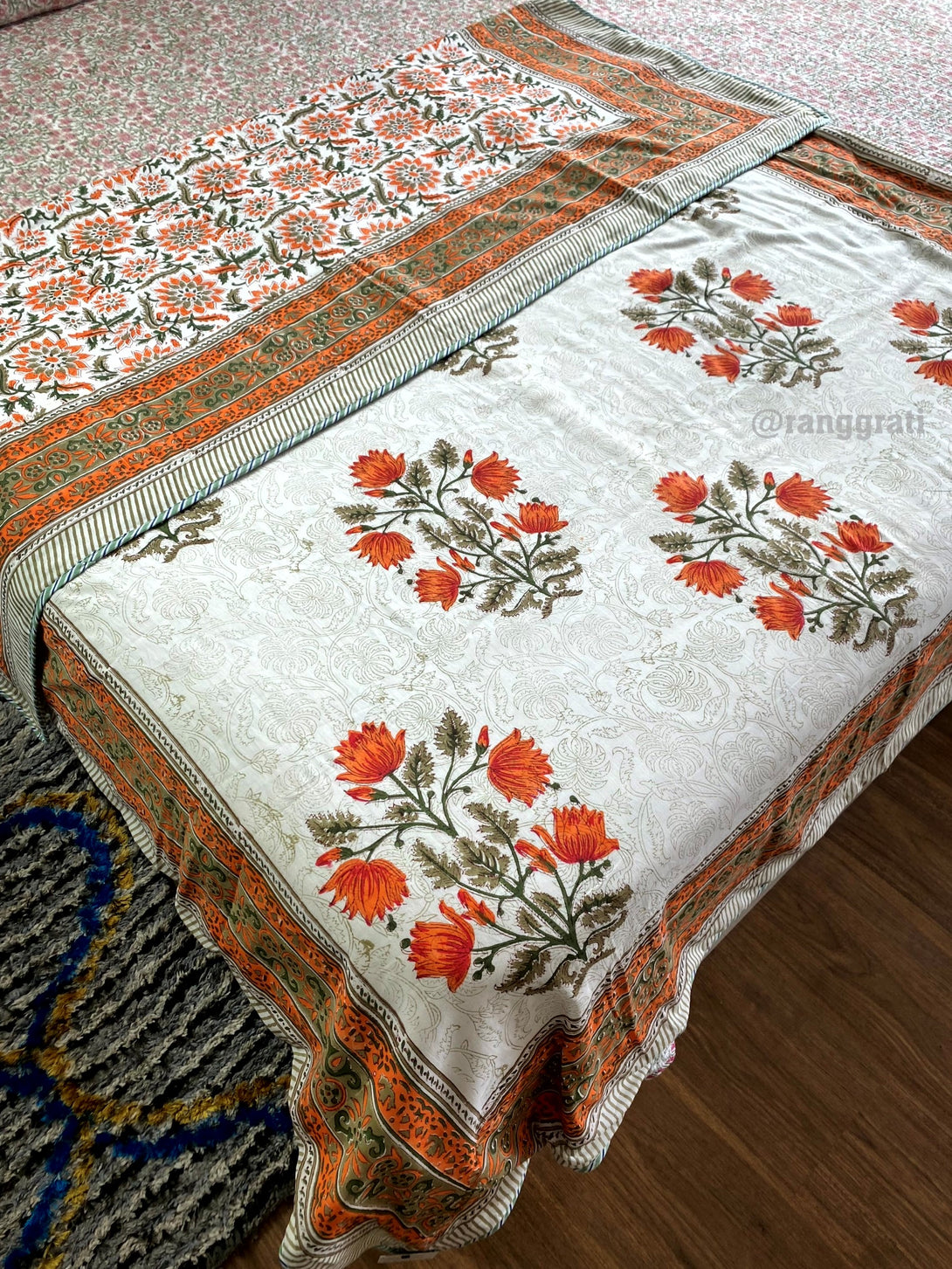 Mulmul cotton single bed dohar with orange lotus floral print, reversible