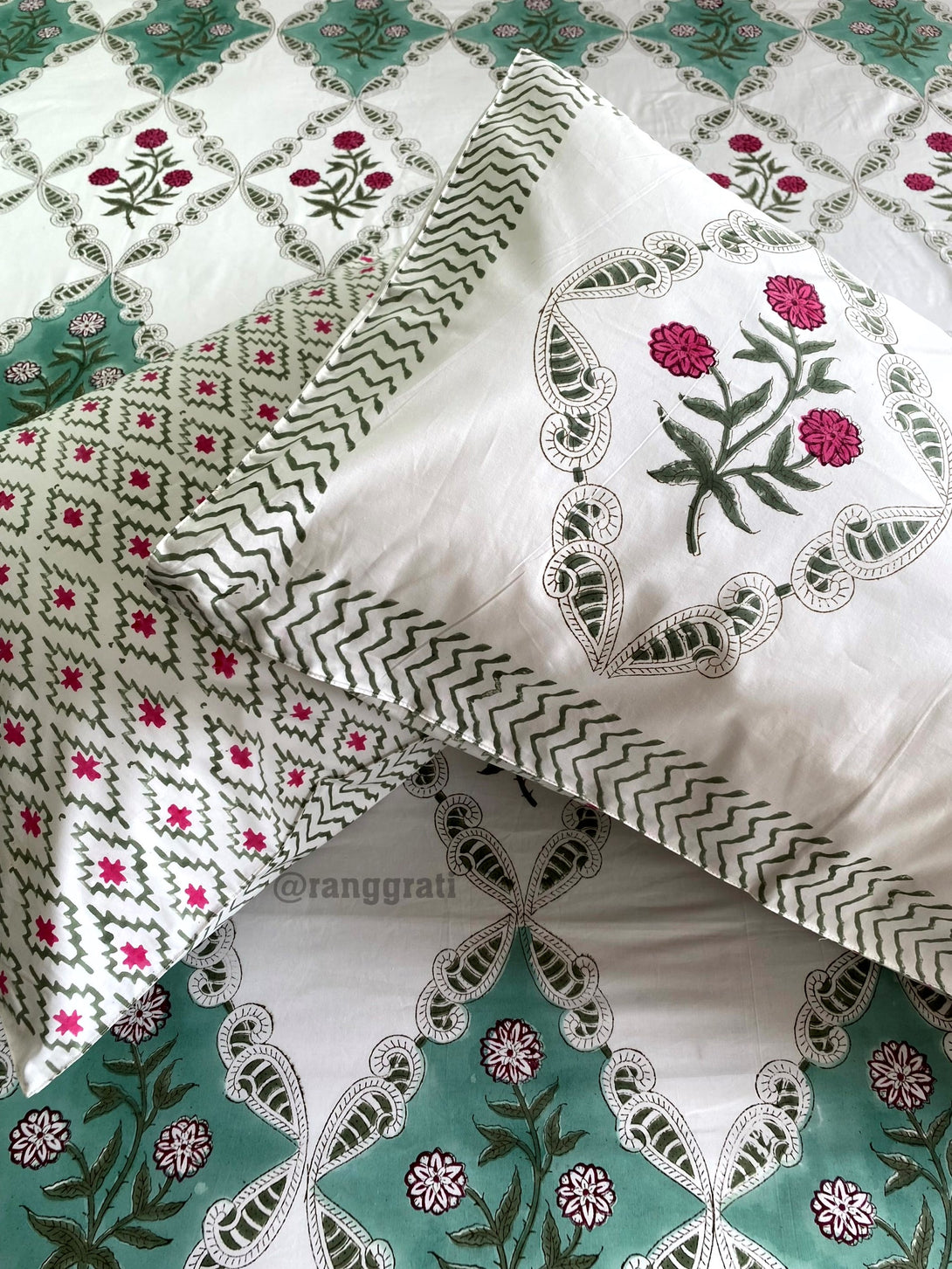 Vibrant Red Floral Bedsheet Paired with Matching Quilted Bedcover