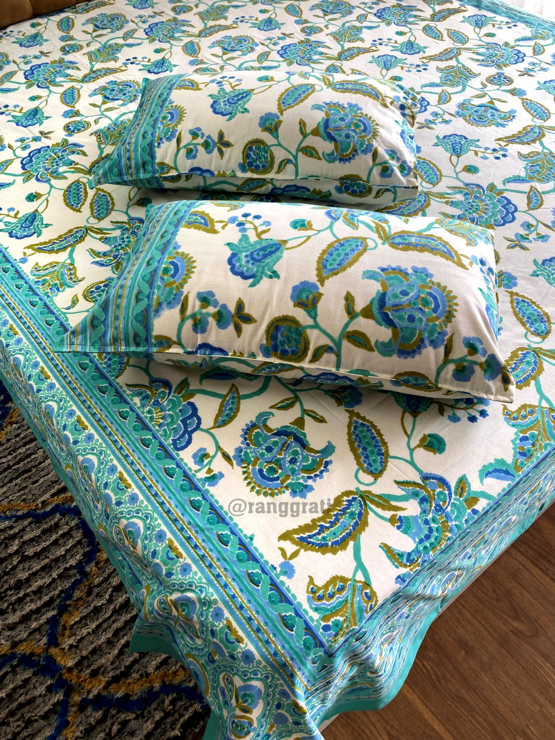 Turquoise Floral Cotton Bedsheet & Mulmul Dohar Set With Pillow Covers