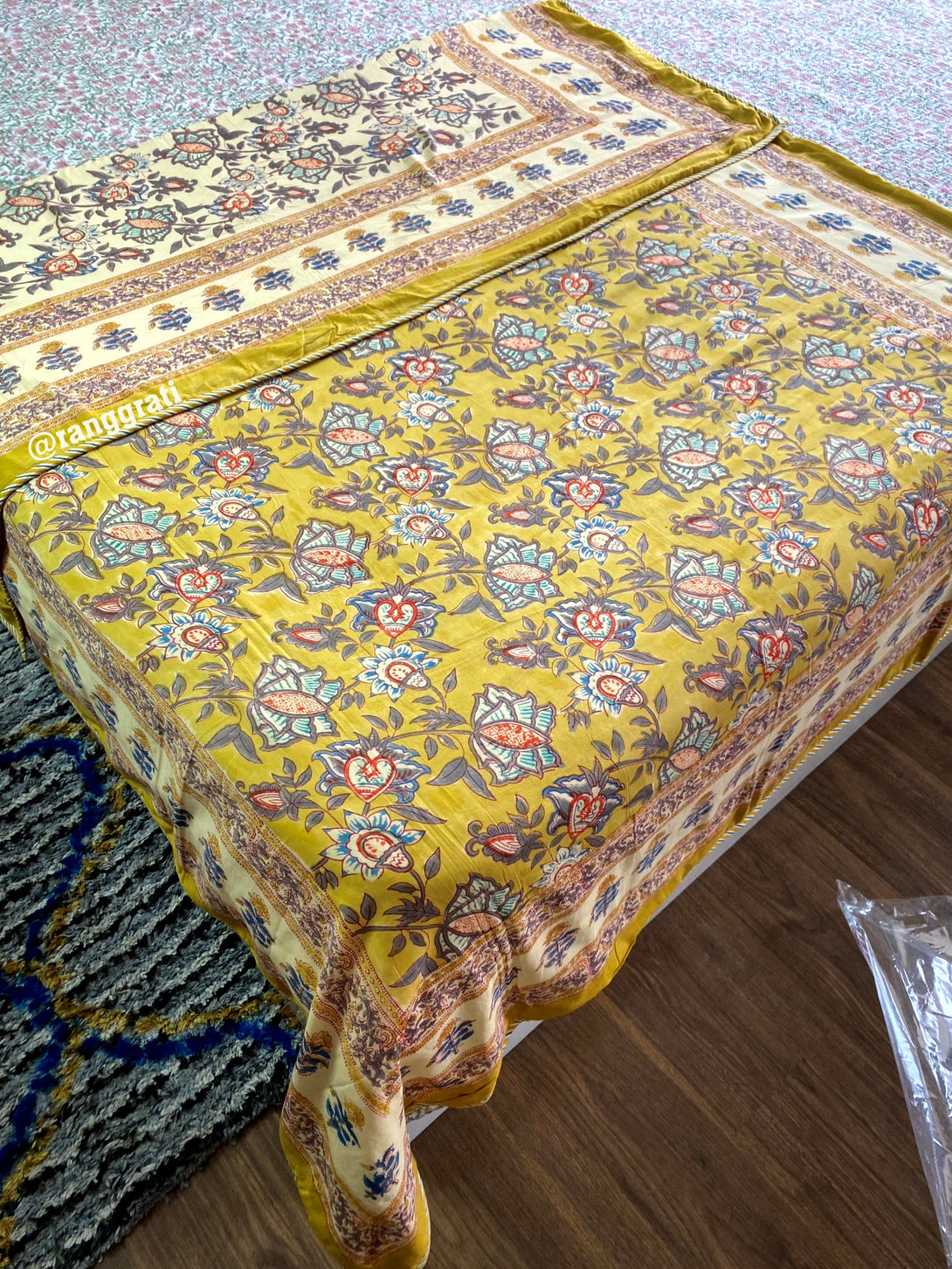 Single bed dohar in mulmul cotton with yellow floral print, reversible